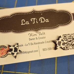 Star Shaped 0.5" Earrings Cow Print